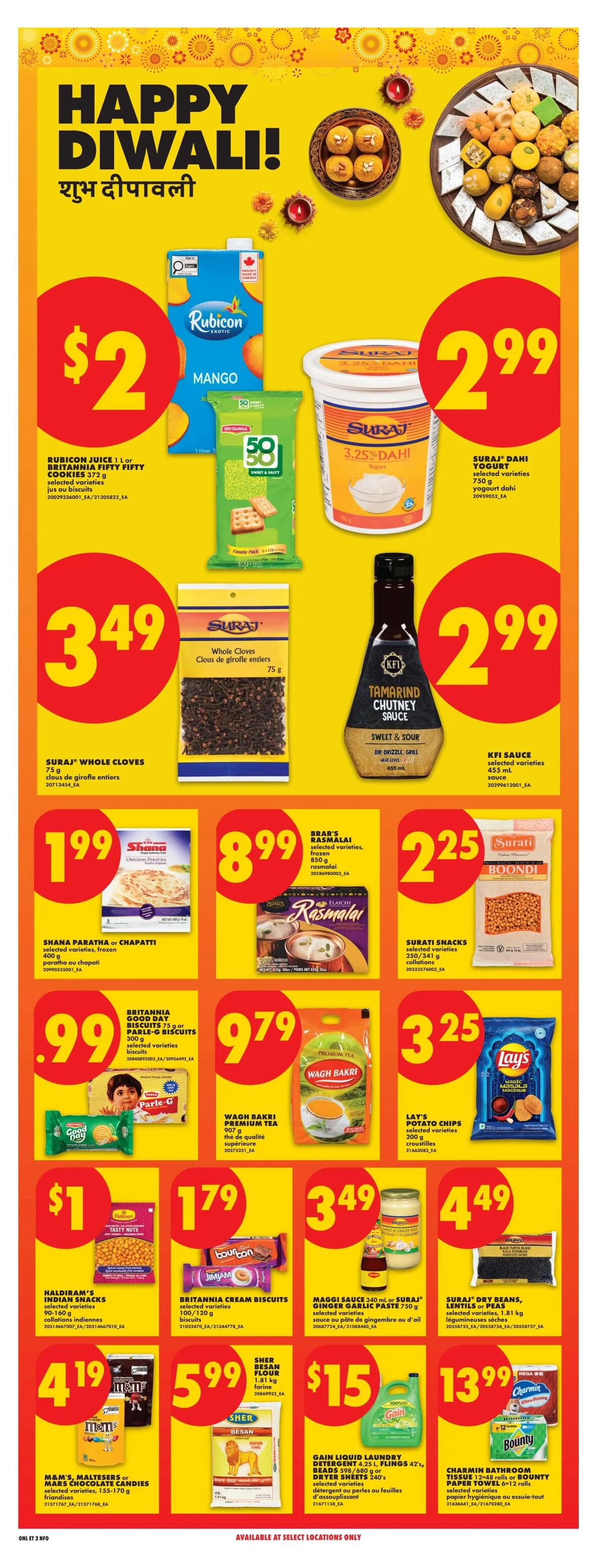 Happy Diwali! This No Frills flyer features a variety of products for the celebration. Highlights include Rubicon Juice 1 L or Britannia Fifty Fifty Cookies for $2, Suraj Dahi Yogurt for $2.99, and Suraj Whole Cloves for $3.49. Also featured are KFI Sauce for $2.99, Shana Paratha or Chapati for $1.99, Brar's Rasmalai for $8.99, and Surati Snacks for $2.25. Other deals include Britannia Cream Biscuits for $1.79, Wagh Bakri Premium Tea for $9.79, Lay's Potato Chips for $3.25, Haldiram's Indian Snacks for $1, Maggi Sauce or Suraj Ginger Garlic Paste for $3.49, Suraj Dry Beans, Lentils or Peas for $4.49, M&M's, Maltesers or Mars Chocolate Candies for $4.19, Sher Besan Flour for $5.99, and Gain Liquid Laundry Detergent or Charmin Bathroom Tissue/Bounty Paper Towel for $15 and $13.99 respectively.