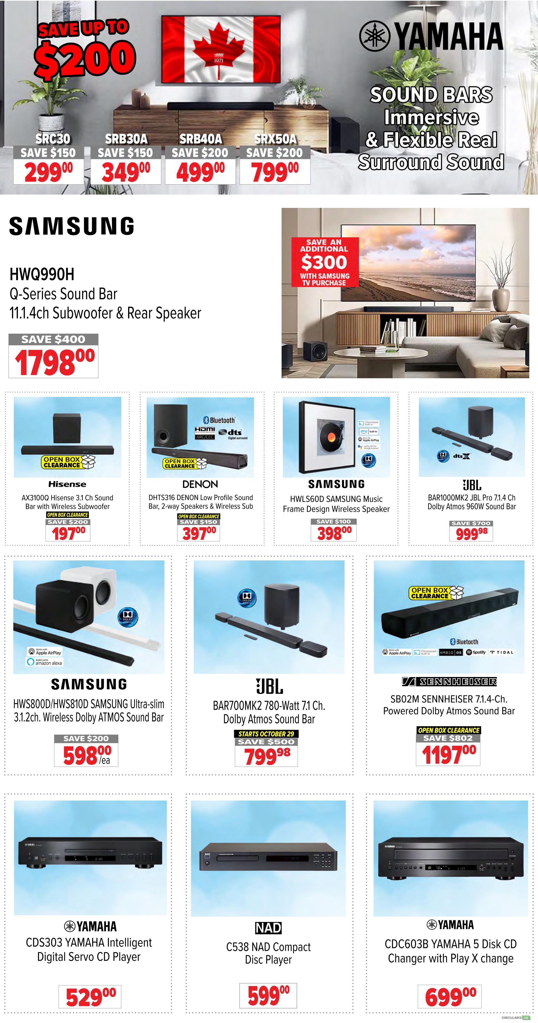 2001 Audio Video weekly flyer specials page 5 features Yamaha sound bars with savings up to $200 on models SRC30 for $299.00, SRB30A for $349.00, SRB40A for $499.00, and SRX50A for $799.00. Also featured is the Samsung HWQ990H Q-Series Sound Bar 11.1.4ch Subwoofer & Rear Speaker for $1798.00 with a save $400 offer. Open box clearance deals include the Hisense AX3100Q 3.1 Ch Sound Bar with Wireless Subwoofer for $197.00 (save $200), Denon DHTS316 Low Profile Sound Bar, 2-way Speakers & Wireless Sub for $397.00 (save $150), Samsung HWLS60D Music Frame Design Wireless Speaker for $398.00 (save $100), and JBL BAR1000MK2 JBL Pro 71.4 Ch Dolby Atmos 960W Sound Bar for $999.98 (save $700). Additional Samsung deals include the HWS800D/HWS810D SAMSUNG Ultra-slim 3.1.2ch. Wireless Dolby ATMOS Sound Bar for $598.00/ea (save $200) and the JBL BAR700MK2 780-Watt 7.1 Ch. Dolby Atmos Sound Bar starting October 29 for $799.98 (save $500). Sennheiser SB02M SENNHEISER 7.1.4-Ch. Powered Dolby Atmos Sound Bar is available as an open box clearance item for $1197.00 (save $802). Yamaha CDS303 Intelligent Digital Servo CD Player is priced at $529.00. NAD C538 Compact Disc Player is $599.00. Yamaha CDC603B 5 Disk CD Changer with Play X change is $699.00. A special offer includes an additional $300 savings with Samsung TV purchase.