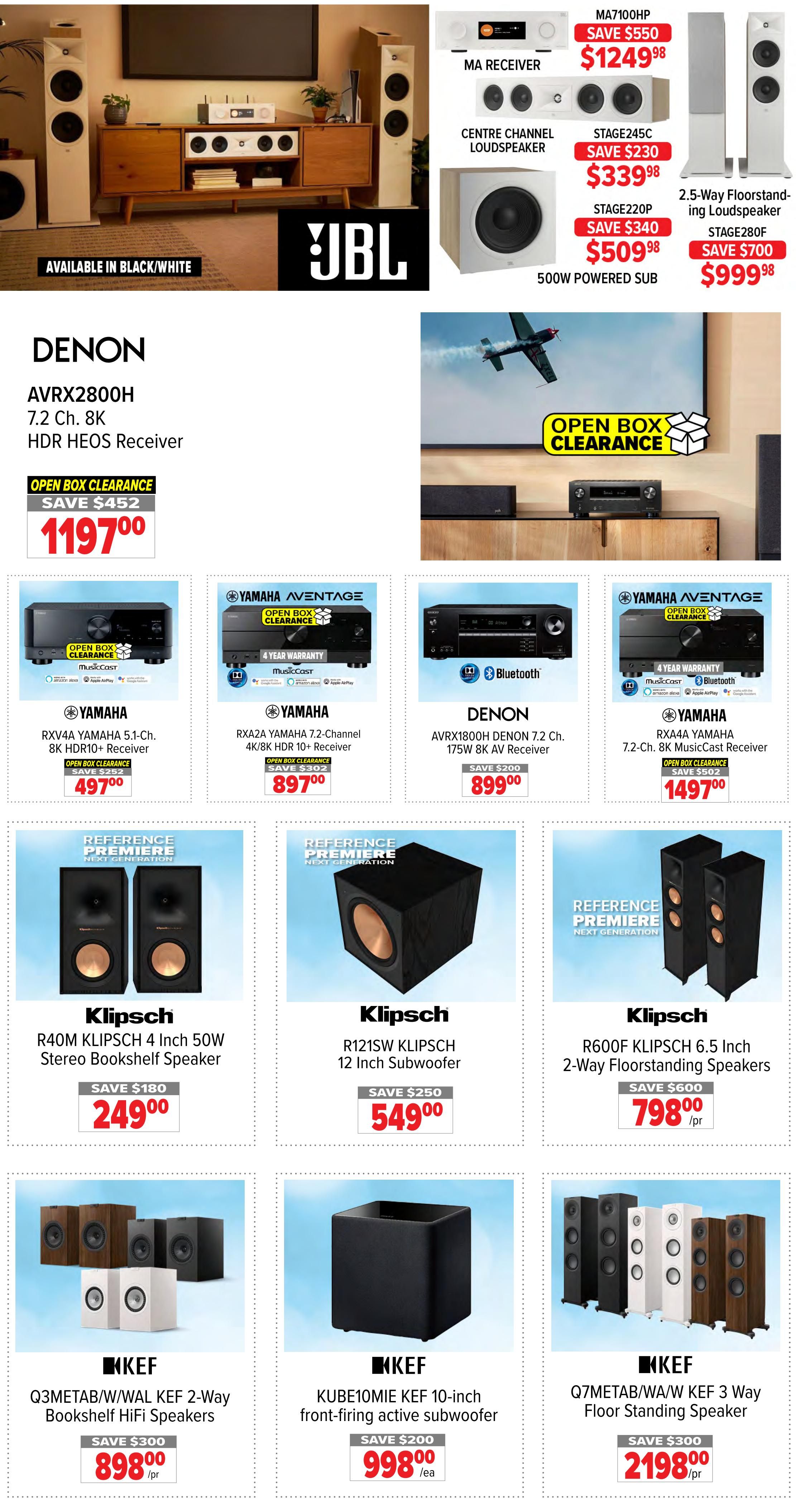 2001 Audio Video weekly flyer specials page 4 features open box clearance deals on audio equipment. Top section shows JBL speakers and a home theatre setup. Also featured are MA Receiver for $1249.98, Centre Channel Loudspeaker for $339.98, and 2.5-Way Floorstand-ing Loudspeaker for $999.98. A Denon AVRX2800H 7.2 Ch. 8K HDR HEOS Receiver is on open box clearance for $1197.00, saving $452. Yamaha Aventage receivers are also on sale: RXV4A Yamaha 5.1-Ch. 8K HDR10+ Receiver for $497.00 (save $252), RXA2A Yamaha 7.2-Channel 4K/8K HDR 10+ Receiver for $897.00 (save $302), and RXA4A Yamaha 7.2-Ch. 8K MusicCast Receiver for $1497.00 (save $502). Denon AVRX1800H 7.2 Ch. 175W 8K AV Receiver is $899.00 (save $200). Klipsch Reference Premiere speakers include the R40M 4 Inch 50W Stereo Bookshelf Speaker for $249.00 (save $180), R121SW 12 Inch Subwoofer for $549.00 (save $250), and R600F 6.5 Inch 2-Way Floorstanding Speakers for $798.00 per pair (save $600). KEF speakers include the Q3METAB/W/WAL KEF 2-Way Bookshelf HiFi Speakers for $898.00 per pair (save $300), KUBE10MIE KEF 10-inch front-firing active subwoofer for $998.00 each (save $200), and Q7METAB/W/AW KEF 3 Way Floor Standing Speaker for $2198.00 per pair (save $300).