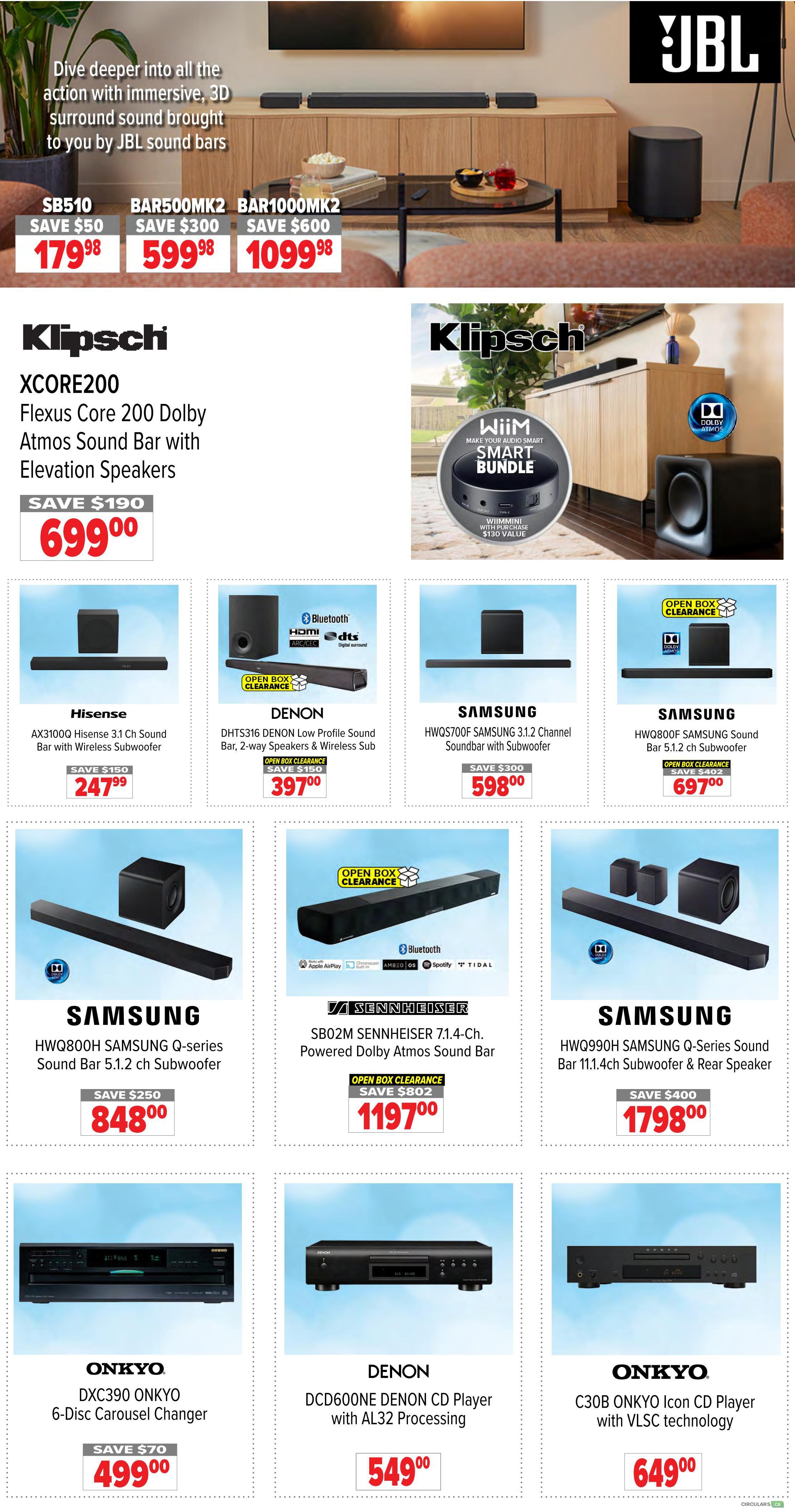 2001 Audio Video weekly flyer specials page 5 features JBL sound bars with immersive 3D surround sound, including the SB510 for $179.98 (save $50), BAR500MK2 for $599.98 (save $300), and BAR1000MK2 for $1099.98 (save $600). Also featured is the Klipsch XCORE200 Flexus Core 200 Dolby Atmos Sound Bar with Elevation Speakers for $699.00 (save $190). Other deals include the Hisense AX3100G Hisense 3.1 Ch Sound Bar with Wireless Subwoofer for $247.99 (save $150), DENON DHT5316 DENON Low Profile Sound Bar, 2-way Speakers & Wireless Sub (Open Box Clearance) for $397.00 (save $150), SAMSUNG HWQS700F SAMSUNG 3.1.2 Channel Soundbar with Subwoofer for $598.00 (save $300), SAMSUNG HWQ800F SAMSUNG Sound Bar 5.1.2 ch Subwoofer (Open Box Clearance) for $697.00 (save $402), SAMSUNG HWQ800H SAMSUNG Q-Series Sound Bar 5.1.2 ch Subwoofer for $848.00 (save $250), SENNHEISER SB02M SENNHEISER 71.4-Ch. Powered Dolby Atmos Sound Bar (Open Box Clearance) for $1197.00 (save $802), SAMSUNG HWQ990H SAMSUNG Q-Series Sound Bar 11.1.4ch Subwoofer & Rear Speaker for $1798.00 (save $400). Electronics include the ONKYO DXC390 ONKYO 6-Disc Carousel Changer for $499.00 (save $70), DENON DCD600NE DENON CD Player with AL32 Processing for $549.00, and ONKYO C30B ONKYO Icon CD Player with VLSC technology for $649.00.