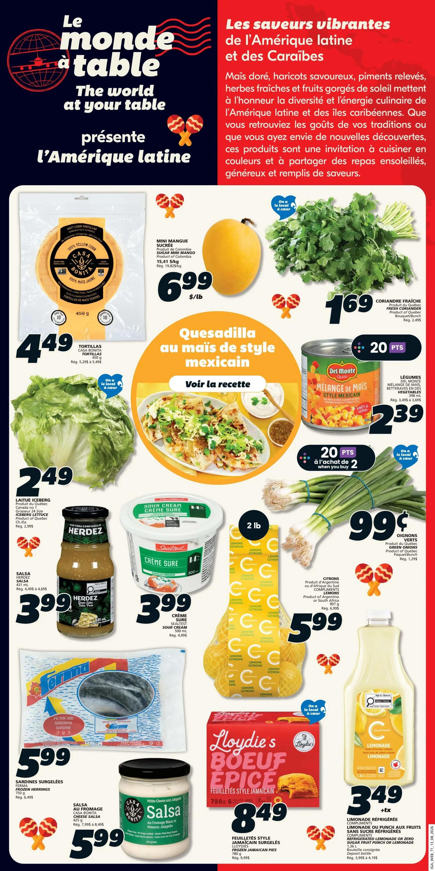 IGA Weekly Flyer Specials, Page 14. Featuring 'The world at your table' presents 'Latin America' theme. Products include: Casa Bonita Soft Corn Tortillas for $4.49, Iceberg Lettuce for $2.49, Herdez Green Salsa for $3.99, Ferma Frozen Sardines for $5.99, Casa Bonita White Cheese and Jalapeno Salsa for $5.99. Also featured are Mini Mangoes for $6.99/lb, Fresh Cilantro for $1.69, Del Monte Mexican Style Corn Blend for $2.39 with 20 bonus points when you buy 2, Green Onions for $0.99 per bunch, Lemons for $5.99, Sealtest Sour Cream for $3.99, and Loydie's Jamaican Spiced Beef Patties for $8.49. Refrigerated Lemonade or Zero Sugar Fruit Punch is on sale for $3.49 plus deposit.