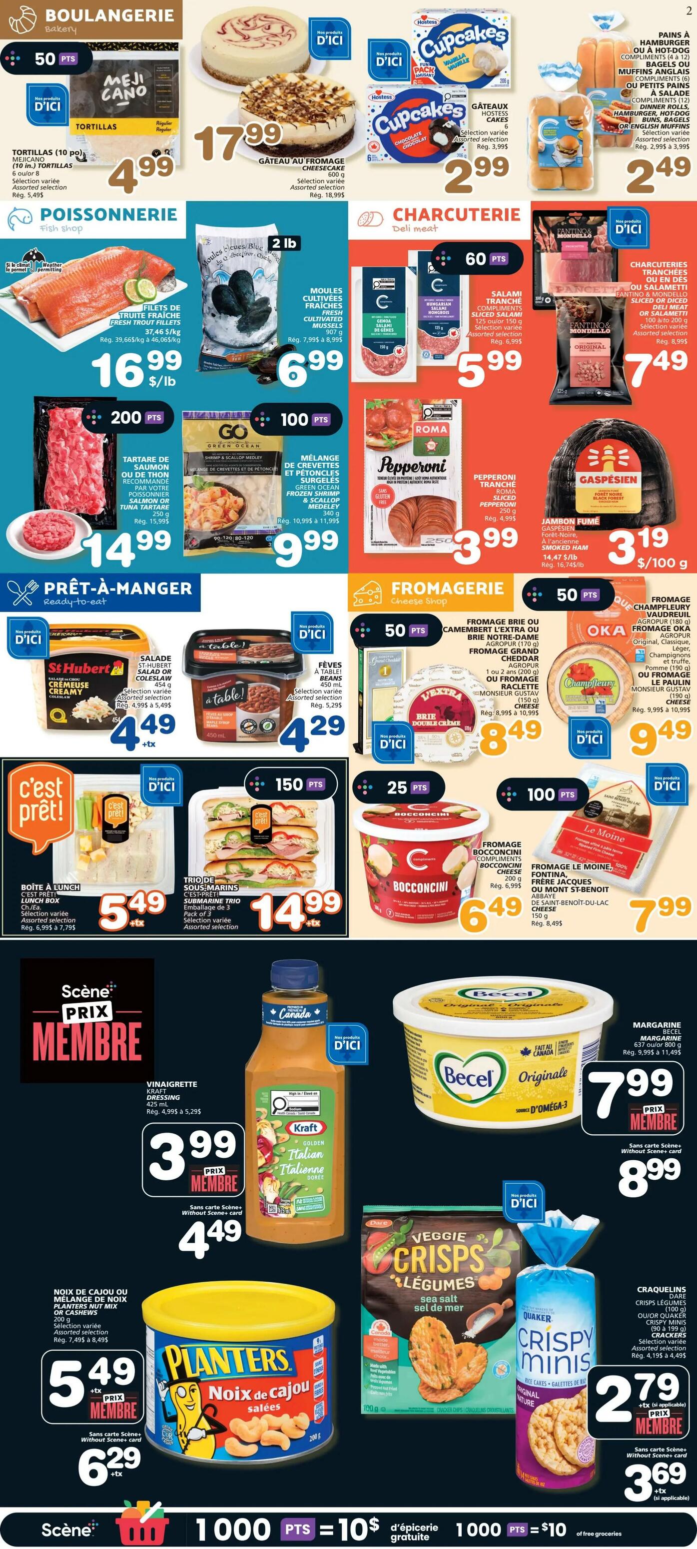 IGA Weekly Flyer Specials Page 3: Bakery section features Meji Cano Tortillas for $4.99 and a Cheesecake for $17.99. Hostess Cupcakes are $2.99 and assorted buns are $2.49. Fish shop offers fresh trout fillets for $16.99/lb and cultivated mussels for $6.99. Deli counter has sliced salami for $5.99 and Fantino & Mondello sliced prosciutto for $7.49. Ready-to-eat section includes St Hubert salad for $4.49, a table! brand meal for $4.29, C'est Prêt! lunch box for $5.49, and C'est Prêt! submarine trio for $14.99. Cheese shop highlights Fromage Brie or Camembert for $8.49, Oka cheese for $9.49, Bocconcini cheese for $6.49, and Le Moine cheese for $7.99. Lower section features Kraft Golden Italian Dressing for $3.99 (member price $4.49), Planters Salted Cashews or Nut Mix for $5.49 (member price $6.29), Dare Veggie Crisps for $2.79 (member price $3.69), and Quaker Crispy Minis for $2.79 (member price $3.69). Scene+ points offer: 1000 points equals $10 in free groceries.